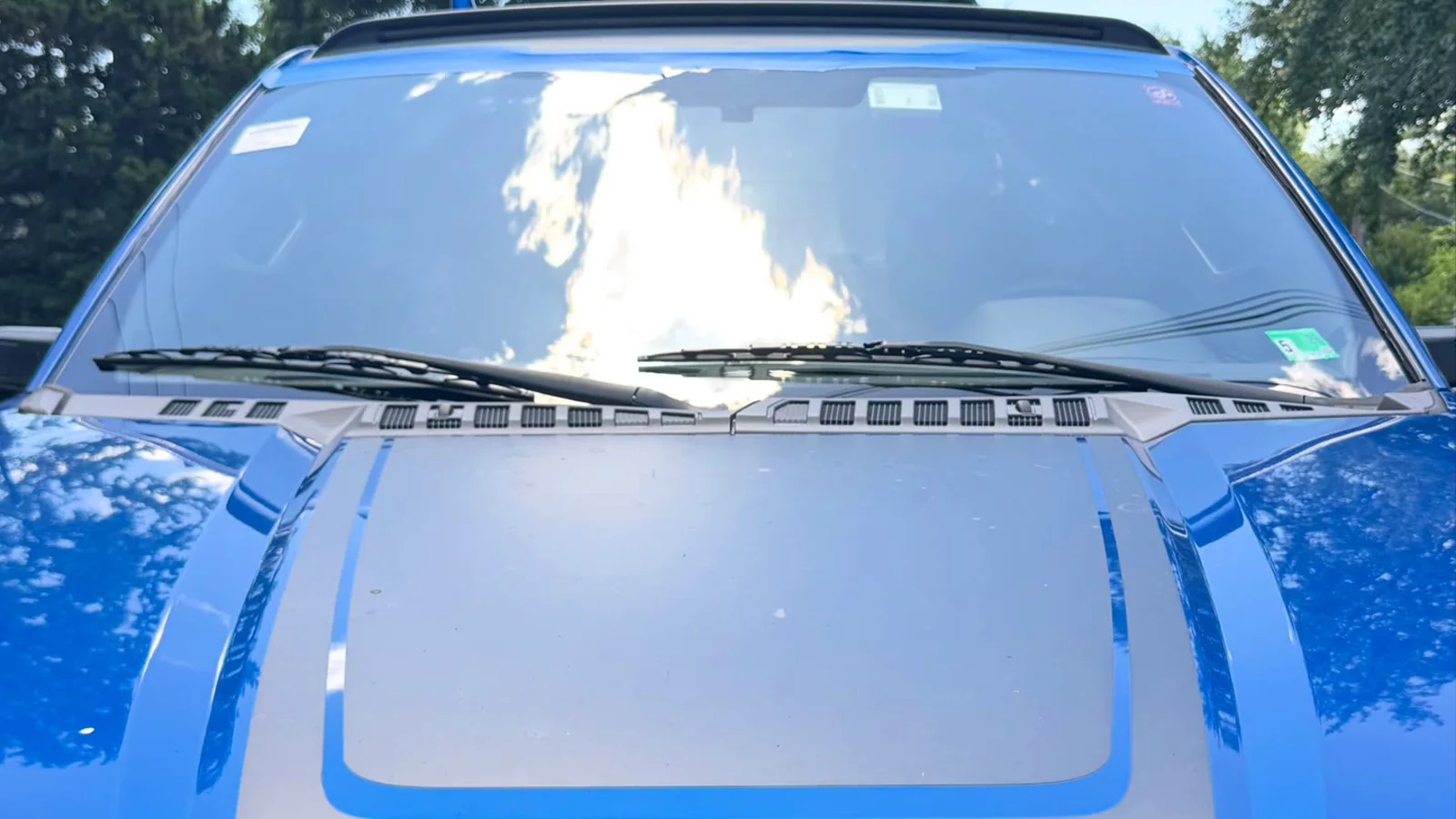 Completed windshield replacement on a blue Ford F-150 by VA Auto Glass